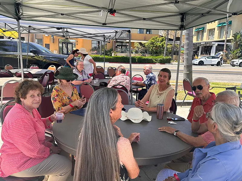 members of the Friends of Madrona Marsh gathered around table