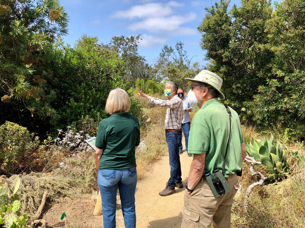Docent led tour through a trail at the Madrona Marsh